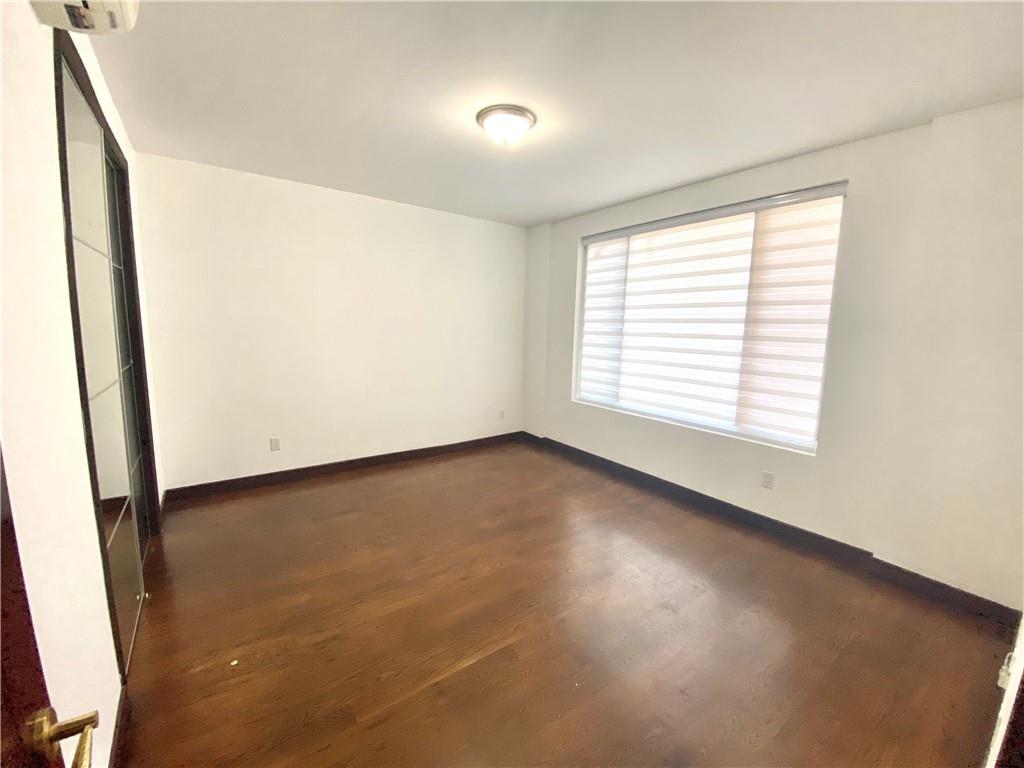 2409 Avenue Z, Unit 202 Brooklyn, NY 11235 - Photo 14 of 26 an empty room with a window