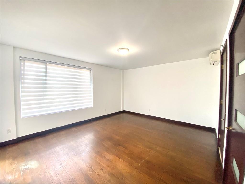 2409 Avenue Z, Unit 202 Brooklyn, NY 11235 - Photo 16 of 26 an empty room with a window