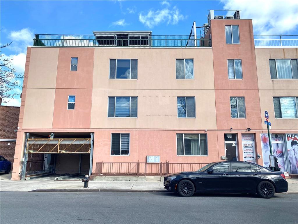 2409 Avenue Z, Unit 202 Brooklyn, NY 11235 - Photo 2 of 26 a car parked in front of a building