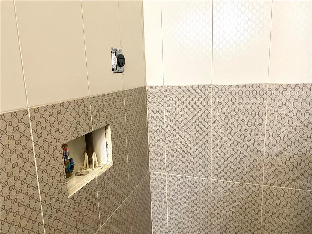 2409 Avenue Z, Unit 202 Brooklyn, NY 11235 - Photo 22 of 26 a bathroom with a shower