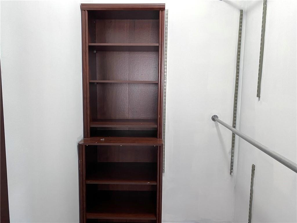 2409 Avenue Z, Unit 202 Brooklyn, NY 11235 - Photo 23 of 26 a view of walk in closet with empty racks