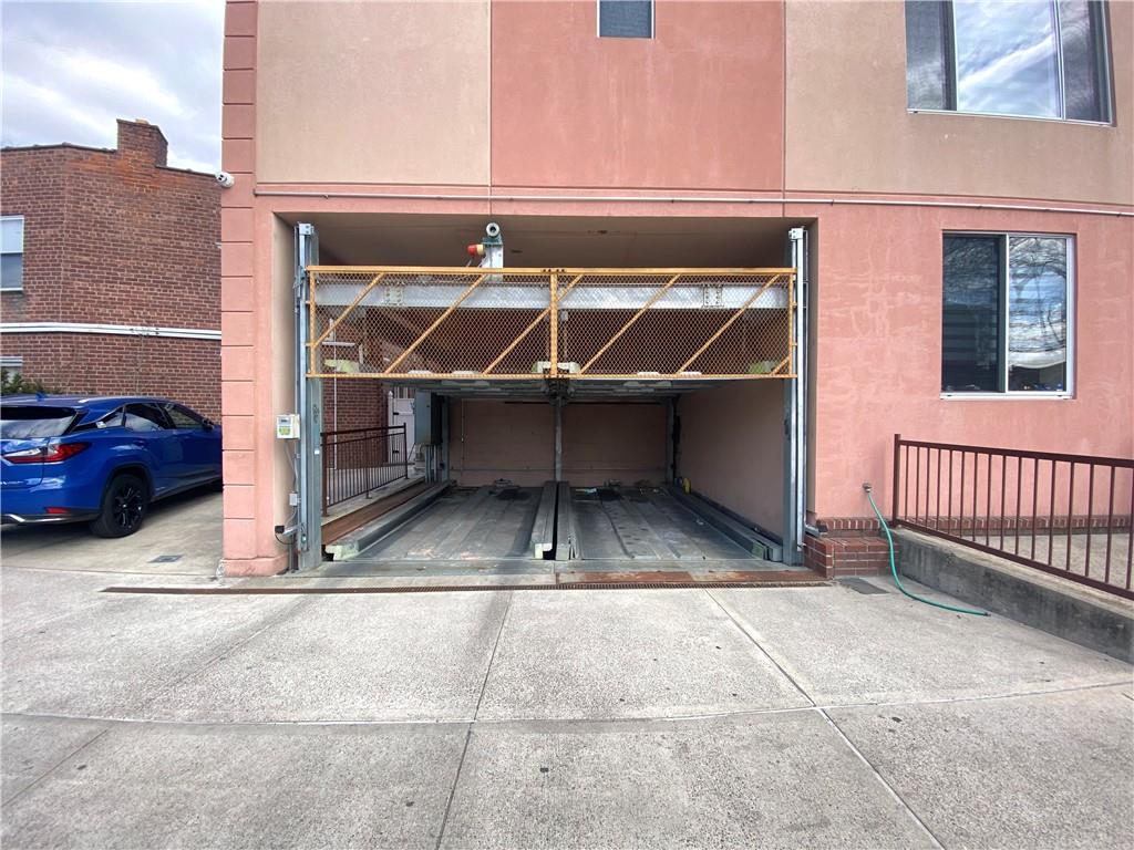 2409 Avenue Z, Unit 202 Brooklyn, NY 11235 - Photo 25 of 26 a view of parking building with parking space
