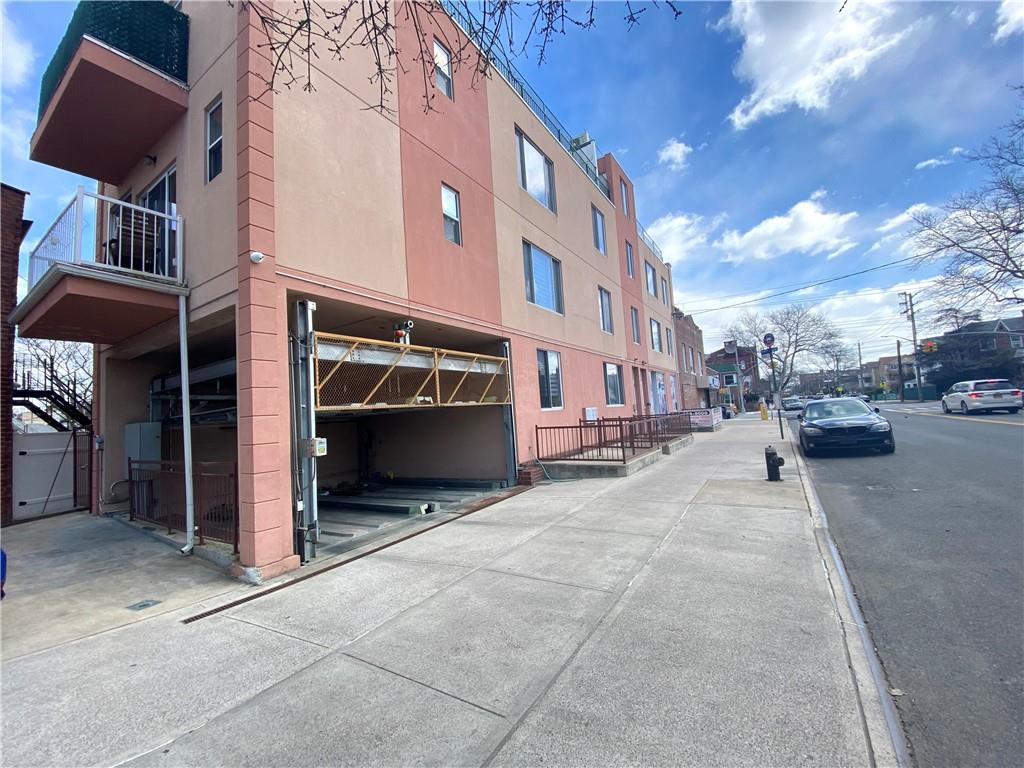 2409 Avenue Z, Unit 202 Brooklyn, NY 11235 - Photo 26 of 26 a view of a building with car parked