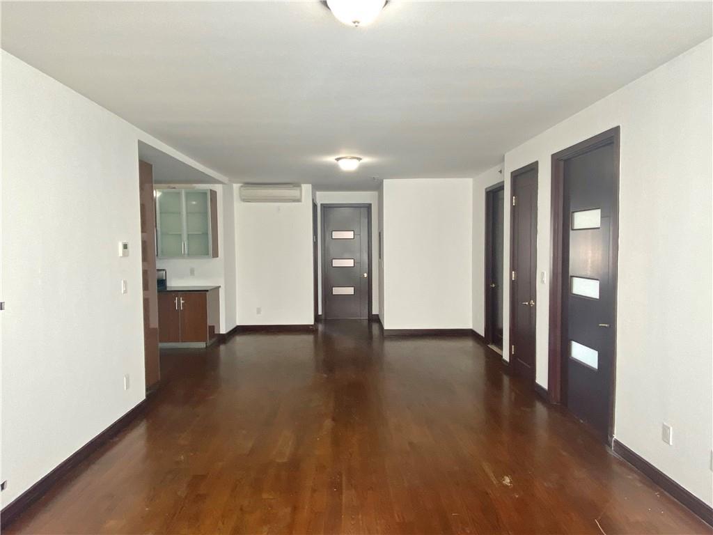 2409 Avenue Z, Unit 202 Brooklyn, NY 11235 - Photo 6 of 26 a view of a livingroom with wooden floor