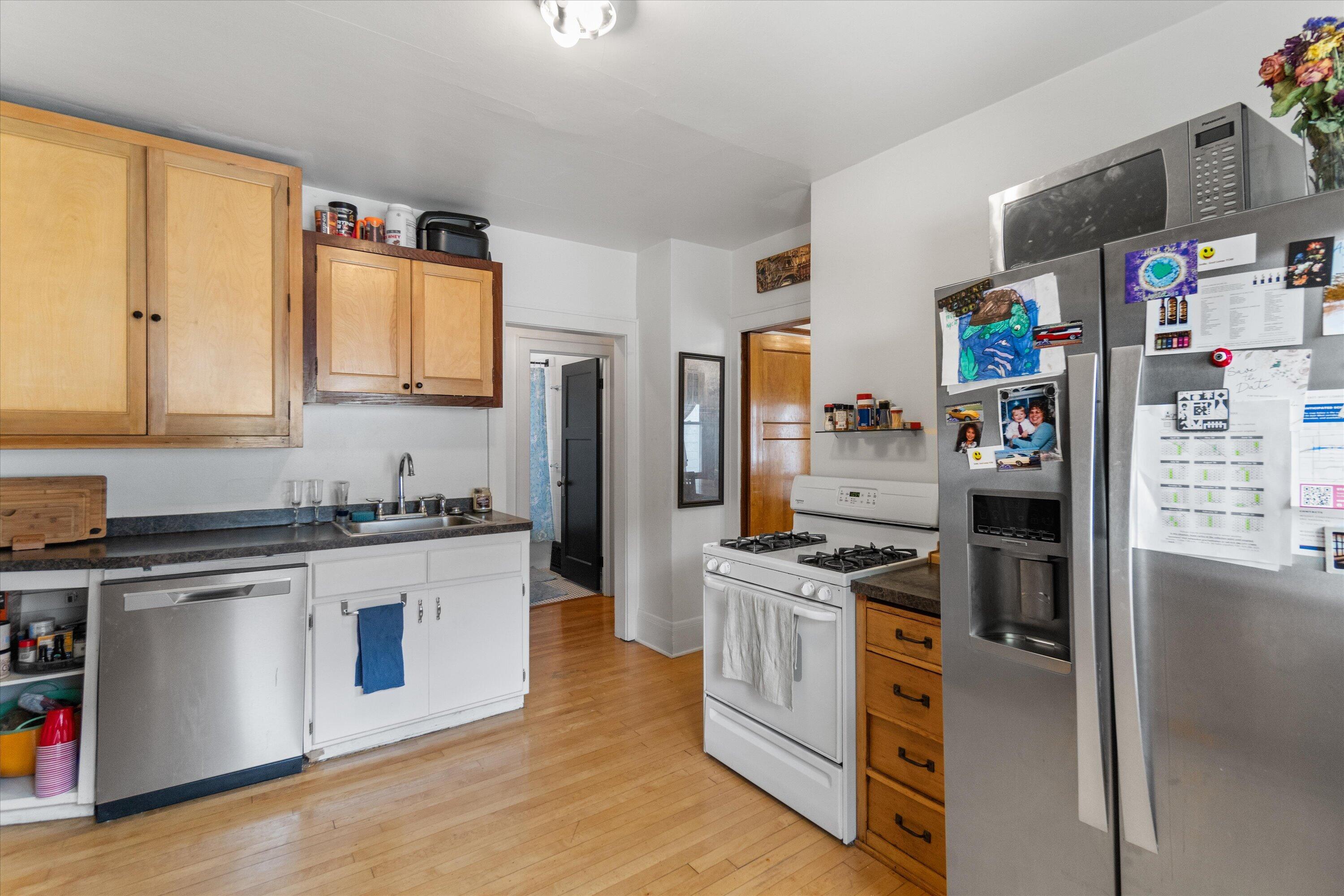 159 North 59th Street Milwaukee, WI 53213 - Photo 22 of 34 Updated kitchen with stainless steel appliances, ample cabinet storage, and functional layout
