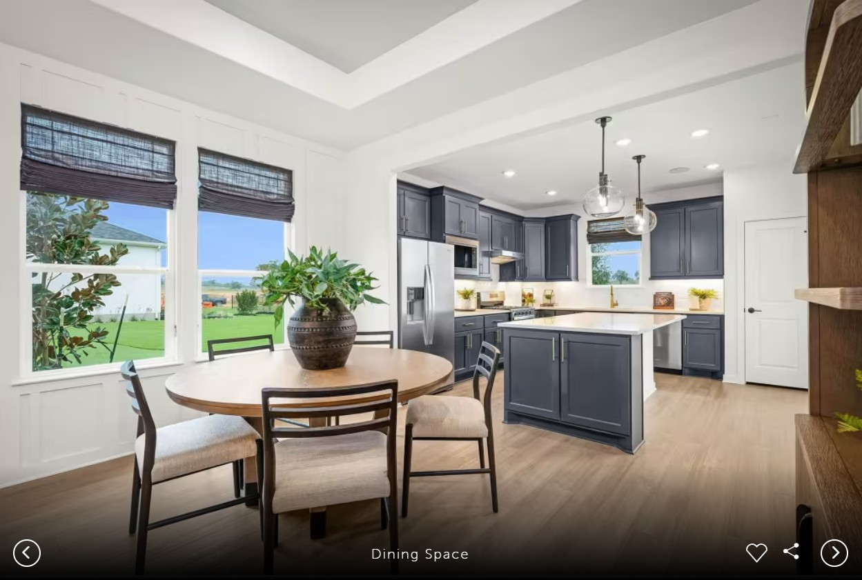 1002 Martingale Street Georgetown, TX 78633 - Photo 10 of 15 a kitchen with a table and chairs