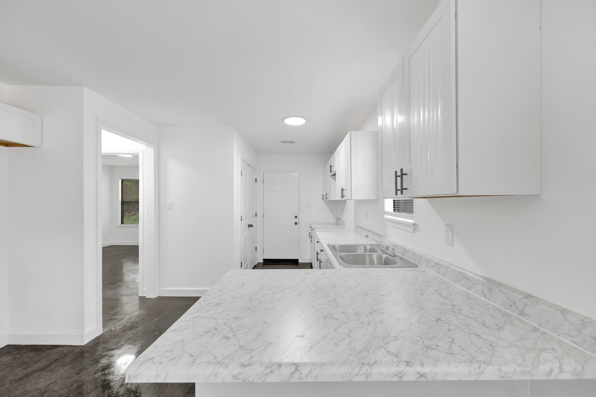 252 Dixie Road Memphis, TN 38109 - Photo 14 of 24 a view of a kitchen with marble kitchen
