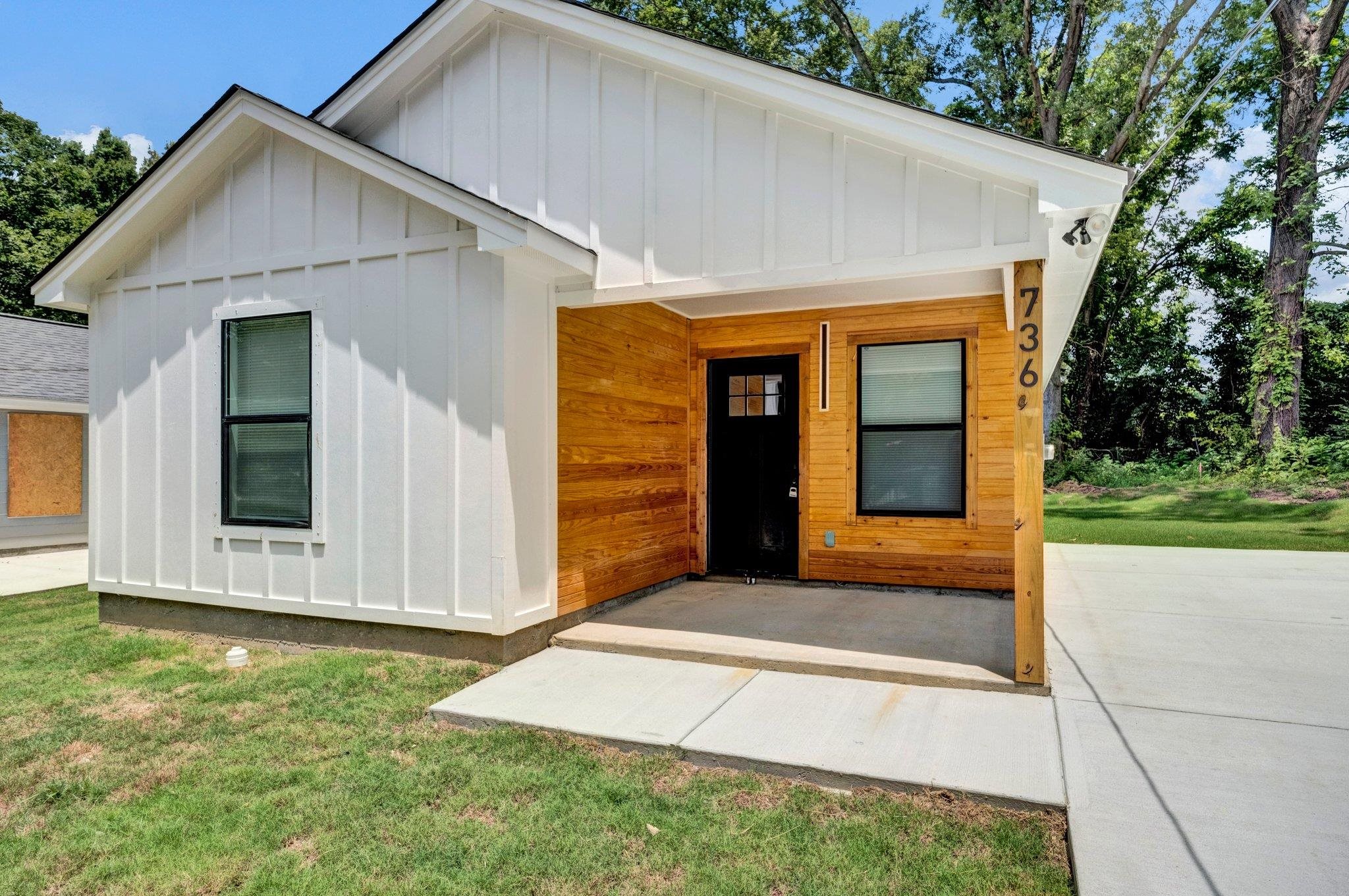 252 Dixie Road Memphis, TN 38109 - Photo 4 of 24 a view of house with backyard and glass windows