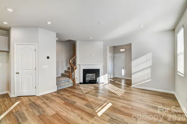 a bedroom with a bed and a fireplace