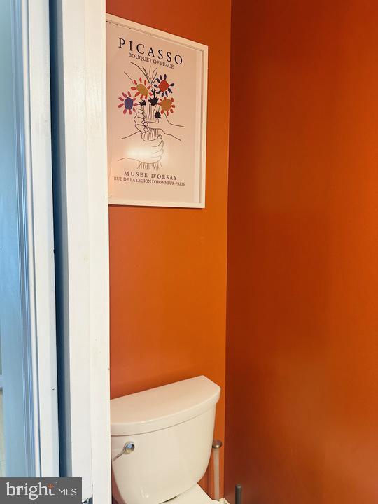 1011 8th Street Northeast Washington, DC 20002 - Photo 22 of 34 a white toilet sitting next to a small bathroom