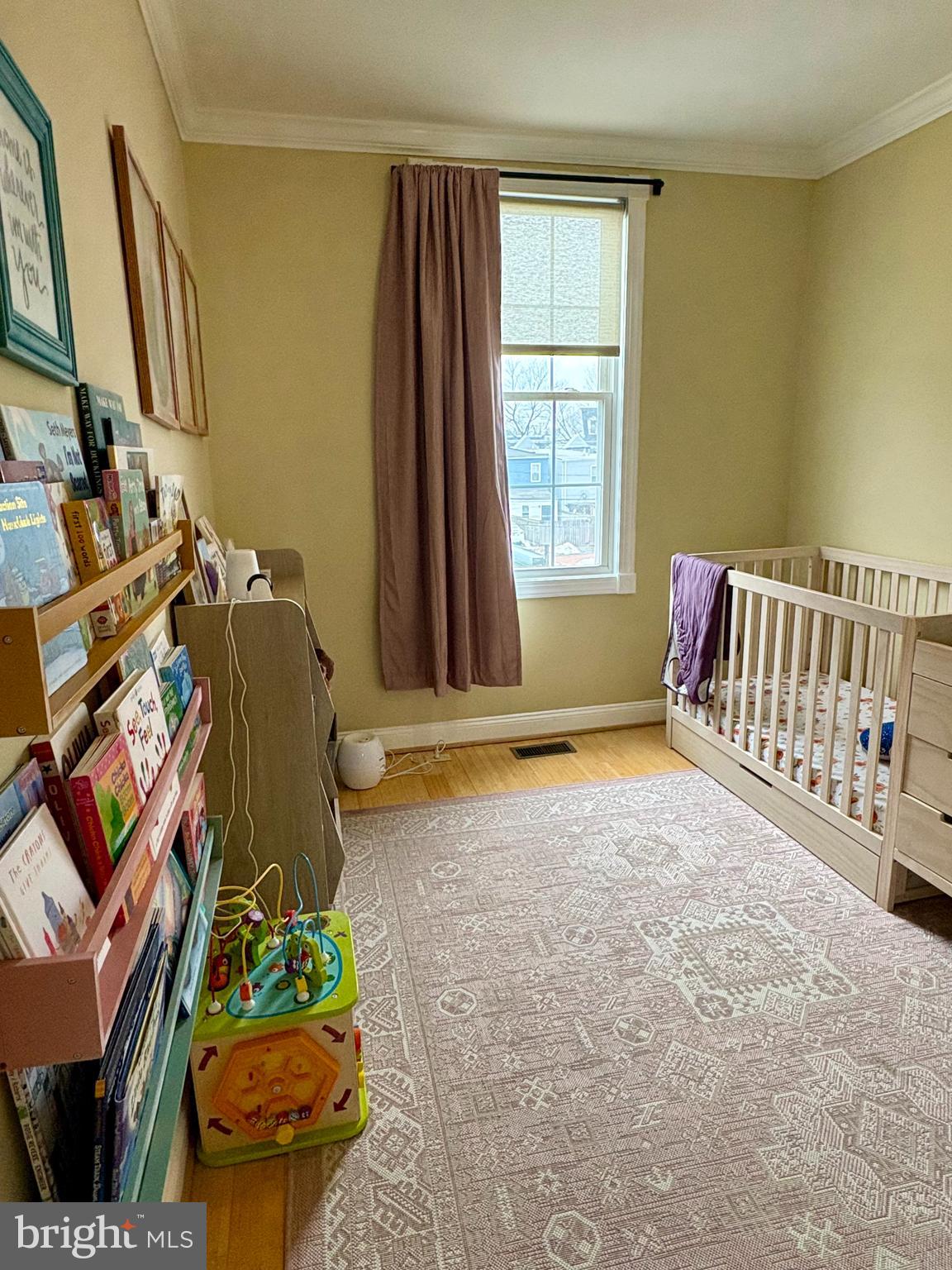 1011 8th Street Northeast Washington, DC 20002 - Photo 25 of 34 a living room with furniture and a window