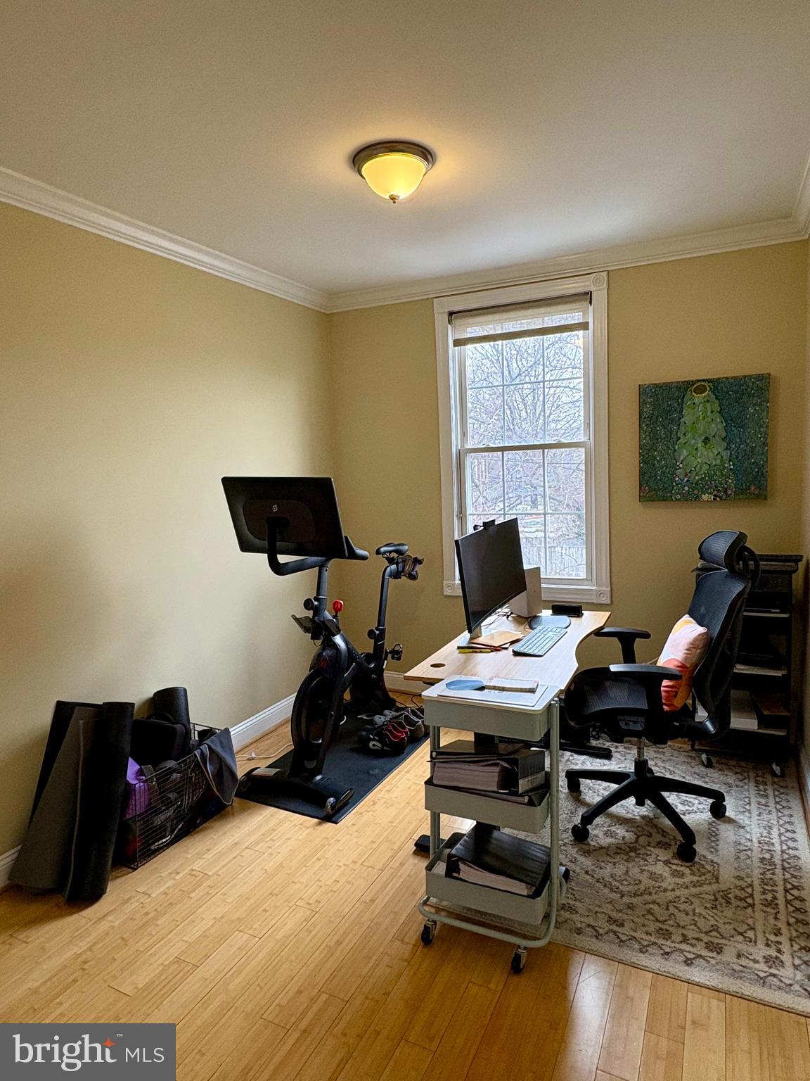 1011 8th Street Northeast Washington, DC 20002 - Photo 27 of 34 a view of a workspace with furniture and a window