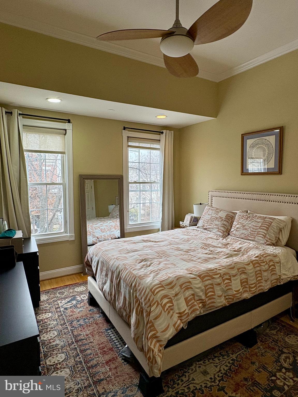 1011 8th Street Northeast Washington, DC 20002 - Photo 30 of 34 a bedroom with a bed and window