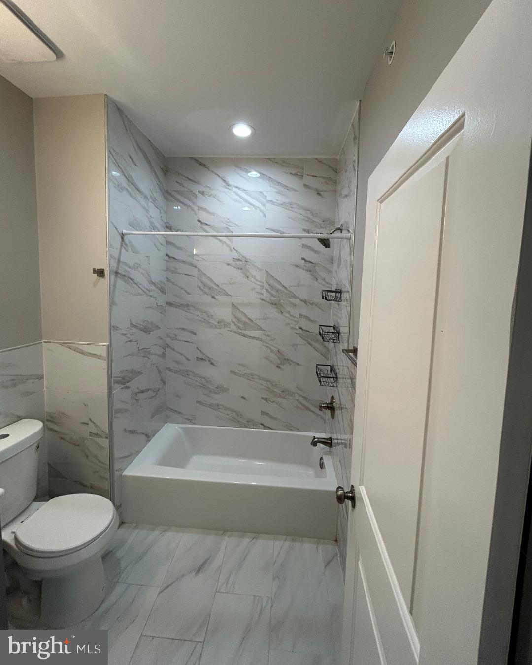 633 Lindley Avenue, Unit 2RF Philadelphia, PA 19120 - Photo 4 of 6 Modern bathroom with elegant marble accents.