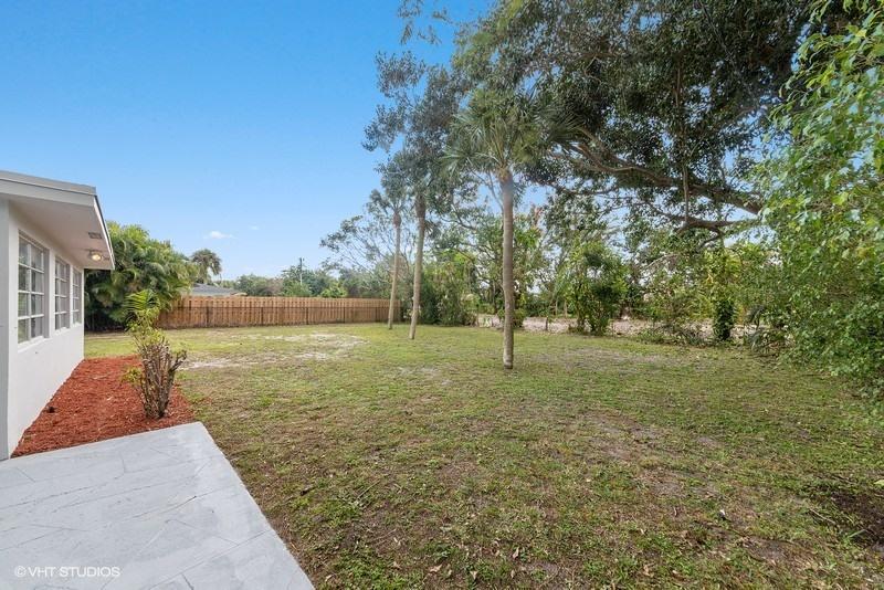 1190 Southwest 14th Street Boca Raton, FL 33486 - Photo 2 of 16 10_1190SW14thSt_26001_BackYard_FlexMLS80