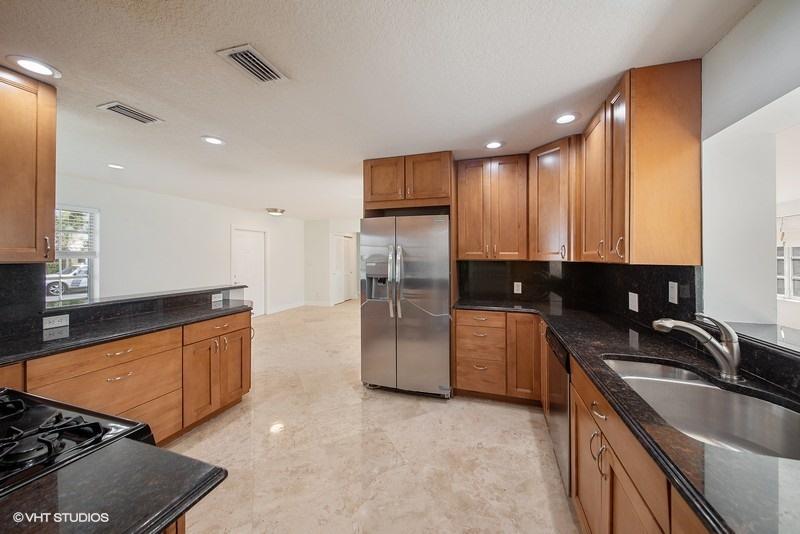 1190 Southwest 14th Street Boca Raton, FL 33486 - Photo 9 of 16 04_1190SW14thSt_177001_Kitchen_FlexMLS80