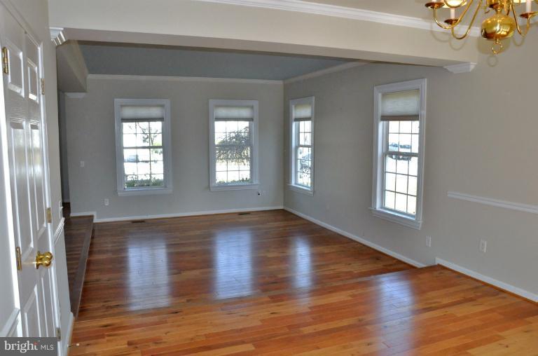 6425 Spring Forest Road Frederick, MD 21701 - Photo 7 of 30 Spacious sunken living room opens to dining room