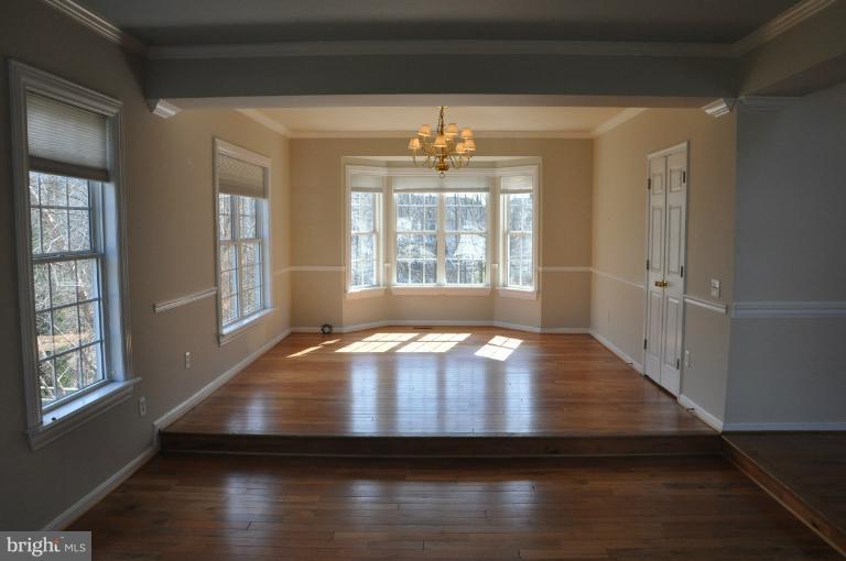 6425 Spring Forest Road Frederick, MD 21701 - Photo 8 of 30 Dining Room w/ wood floors & lots of windows