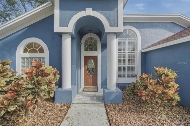 a front view of a house with outdoor space
