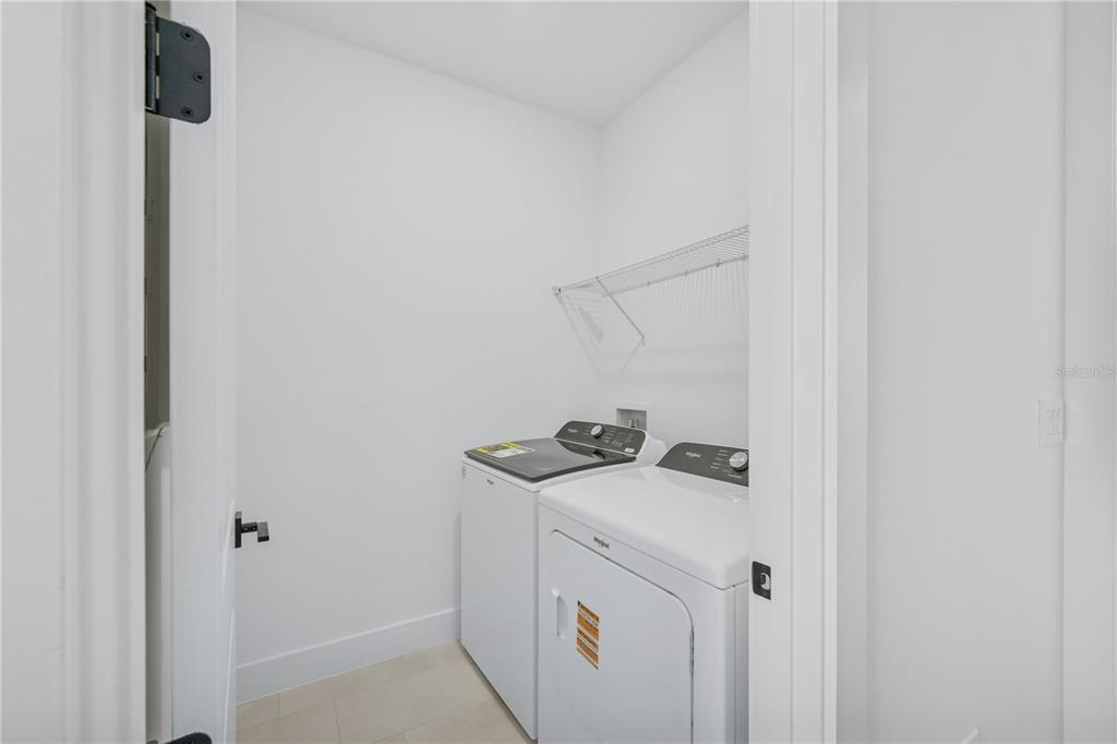 2224 Brix Street Orlando, FL 32804 - Photo 13 of 36 a bathroom with a sink and vanity