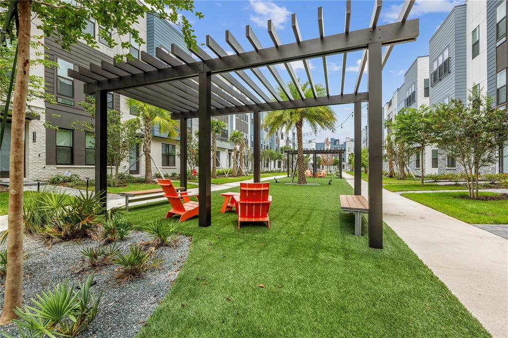 2224 Brix Street Orlando, FL 32804 - Photo 19 of 36 a view of a porch and garden