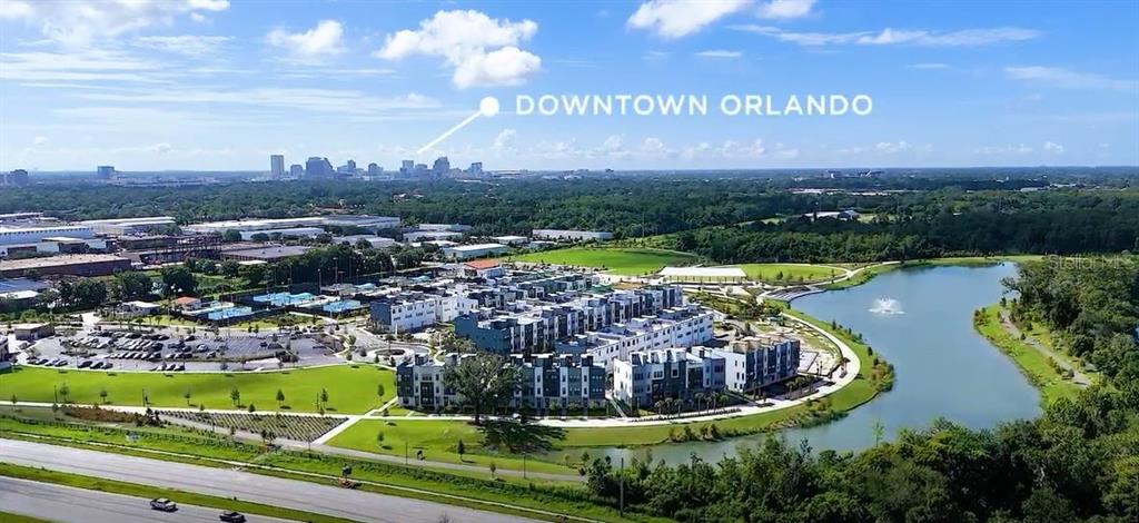 2224 Brix Street Orlando, FL 32804 - Photo 23 of 36 a view of a swimming pool with a yard