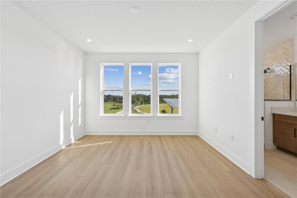 2224 Brix Street Orlando, FL 32804 - Photo 10 of 36 wooden floor in an empty room with a window