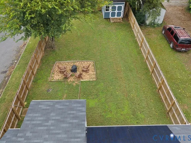 a view of a backyard with a garden