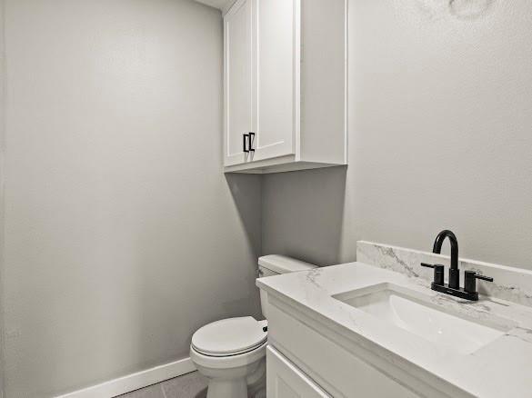 1301 East 9th Street Mount Pleasant, TX 75455 - Photo 15 of 26 a bathroom with a sink a toilet