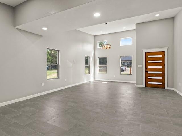 1301 East 9th Street Mount Pleasant, TX 75455 - Photo 2 of 26 an empty room with windows and closet