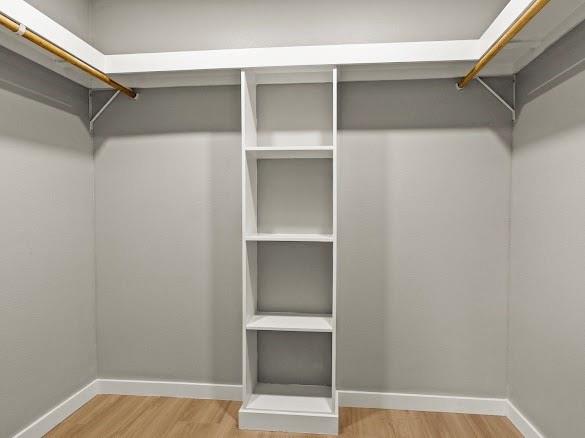 1301 East 9th Street Mount Pleasant, TX 75455 - Photo 24 of 26 a view of an empty walk in closet