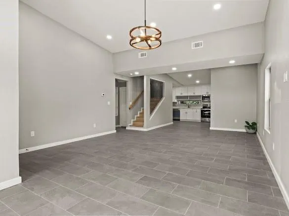 a view of a livingroom with a furniture and a ceiling fan