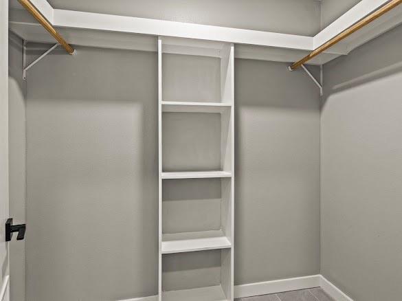 1301 East 9th Street Mount Pleasant, TX 75455 - Photo 10 of 26 a view of an empty walk in closet