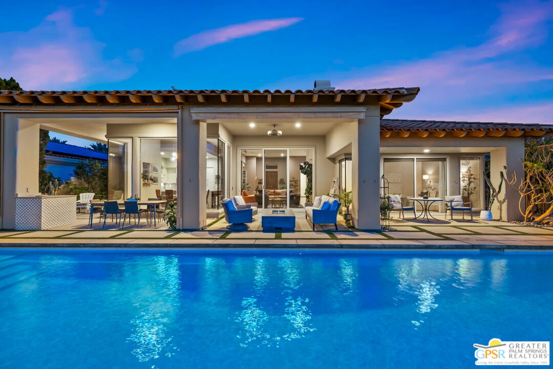 182 Loch Lomond Road Rancho Mirage, CA 92270 - Photo 11 of 48 a view of a living room with furniture and chandelier