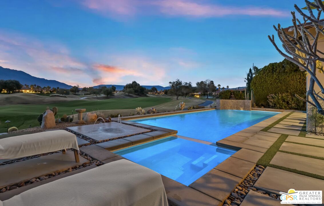 182 Loch Lomond Road Rancho Mirage, CA 92270 - Photo 24 of 48 a view of a backyard with sitting area