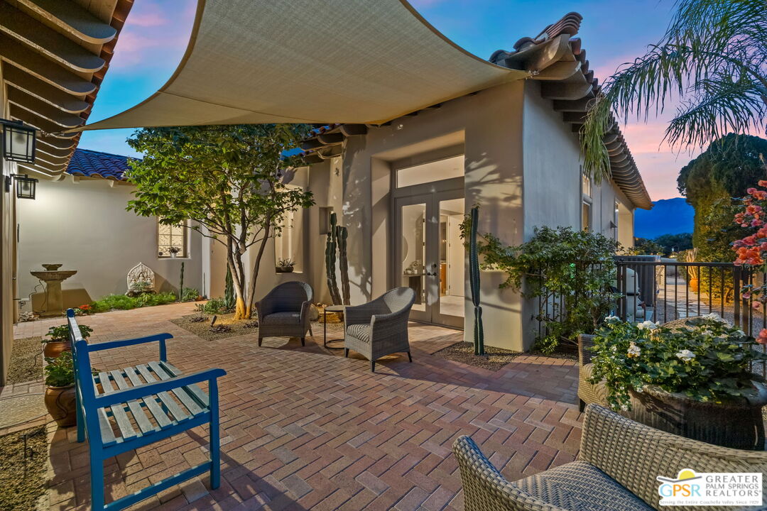 182 Loch Lomond Road Rancho Mirage, CA 92270 - Photo 34 of 48 a view of chairs and tables in patio