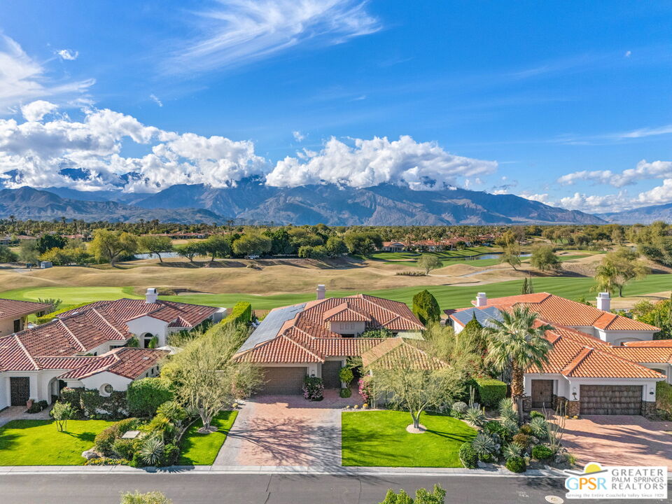 182 Loch Lomond Road Rancho Mirage, CA 92270 - Photo 45 of 48 an aerial view of residential houses with outdoor space and ocean view