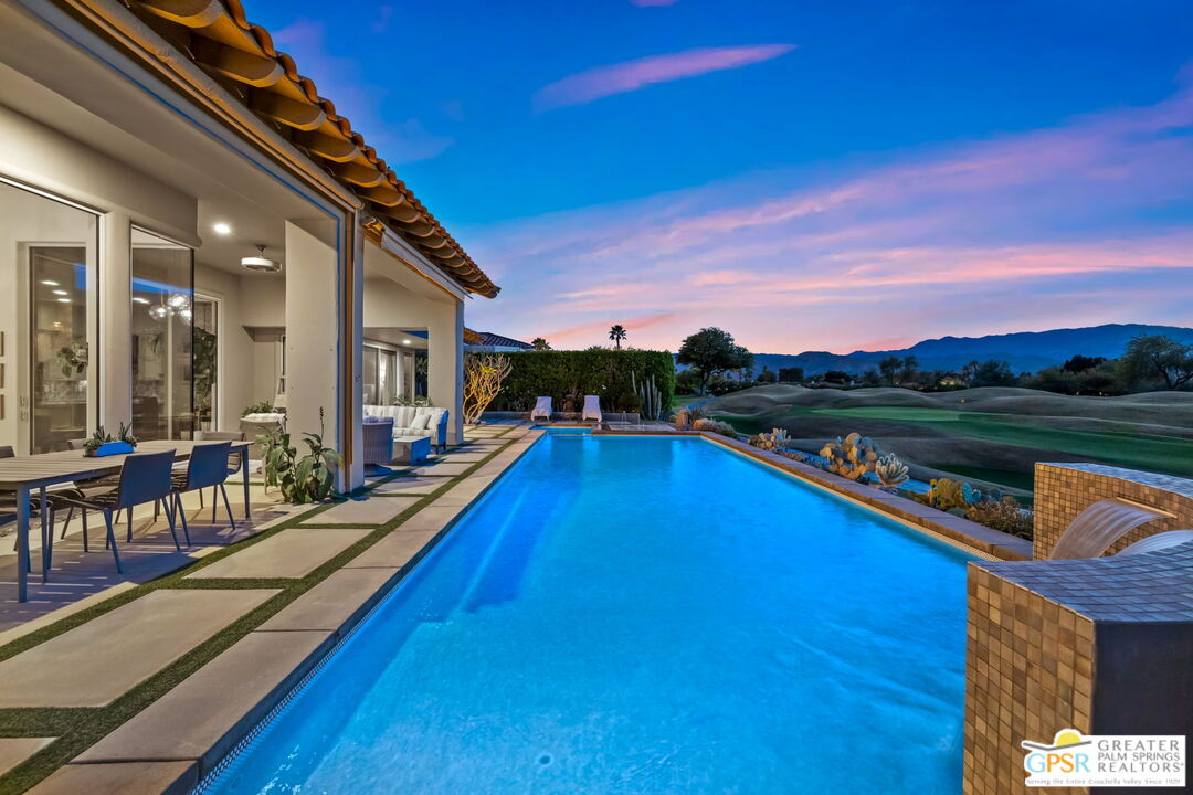 182 Loch Lomond Road Rancho Mirage, CA 92270 - Photo 10 of 48 a view of a house with swimming pool and sitting area