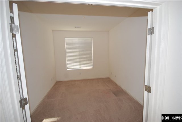 1930 Evergreen Ridge Way Reno, NV 89523 - Photo 11 of 13 an empty room with windows