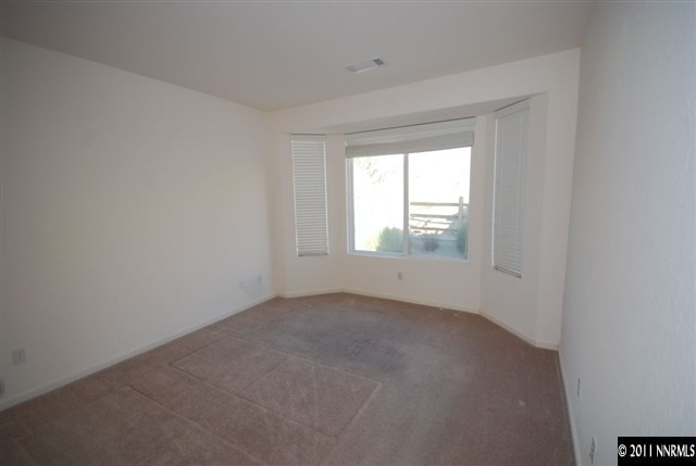 1930 Evergreen Ridge Way Reno, NV 89523 - Photo 6 of 13 an empty room with a window
