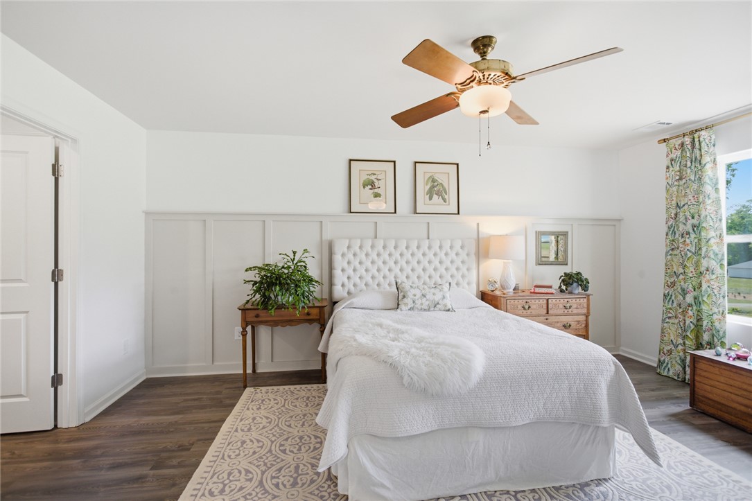 412 Chadwick Lane Walhalla, SC 29691 - Photo 15 of 37 This tranquil bedroom offers abundant natural illumination, hard surface flooring, and a unique board and batten accent wall.