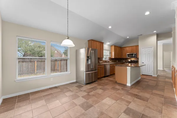 a bathroom with a sink a toilet and a bathtub