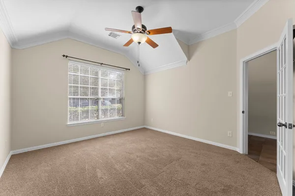a large kitchen with cabinets