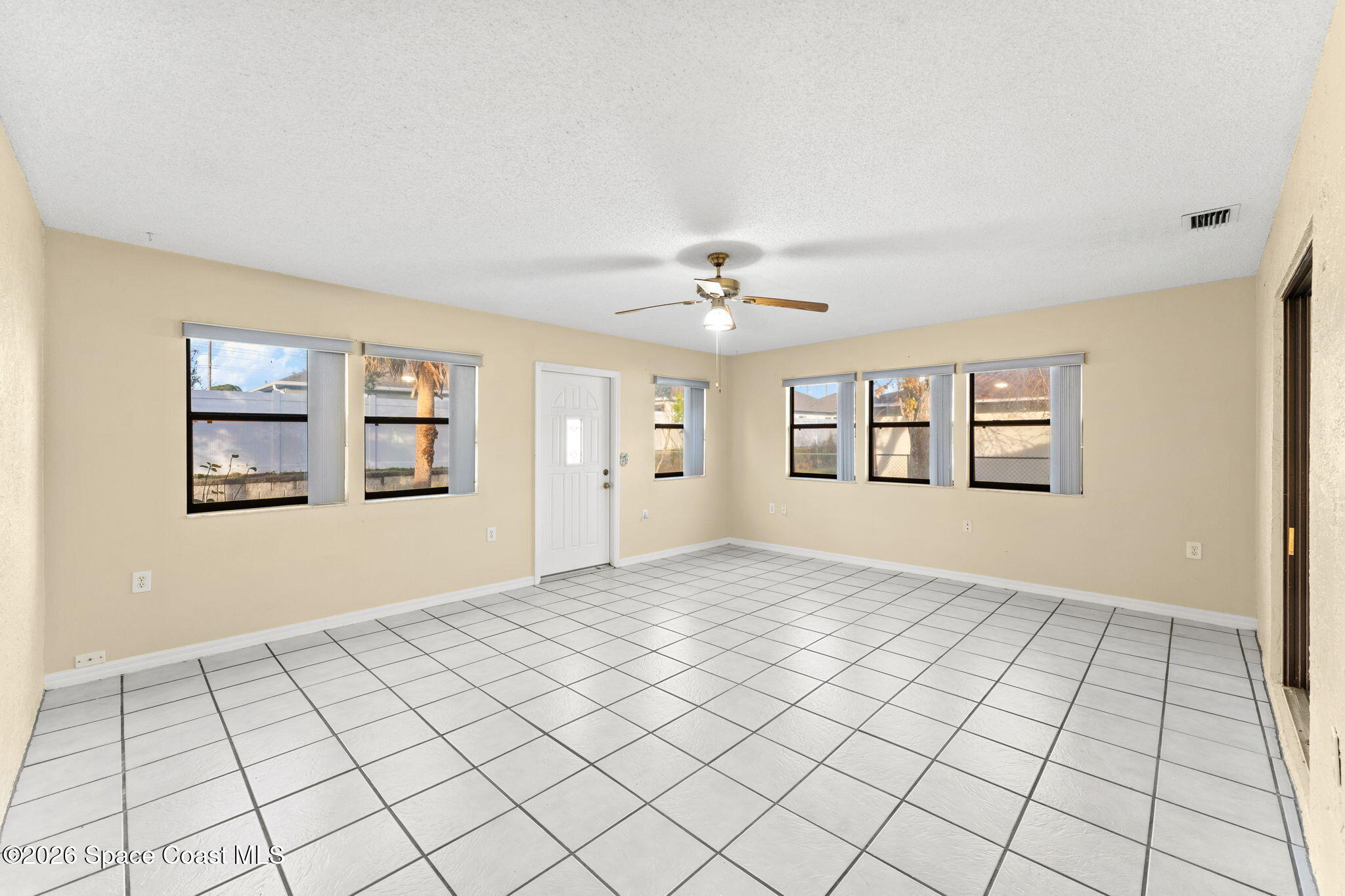 960 Pineland Drive Rockledge, FL 32955 - Photo 11 of 32 a view of an empty room and window