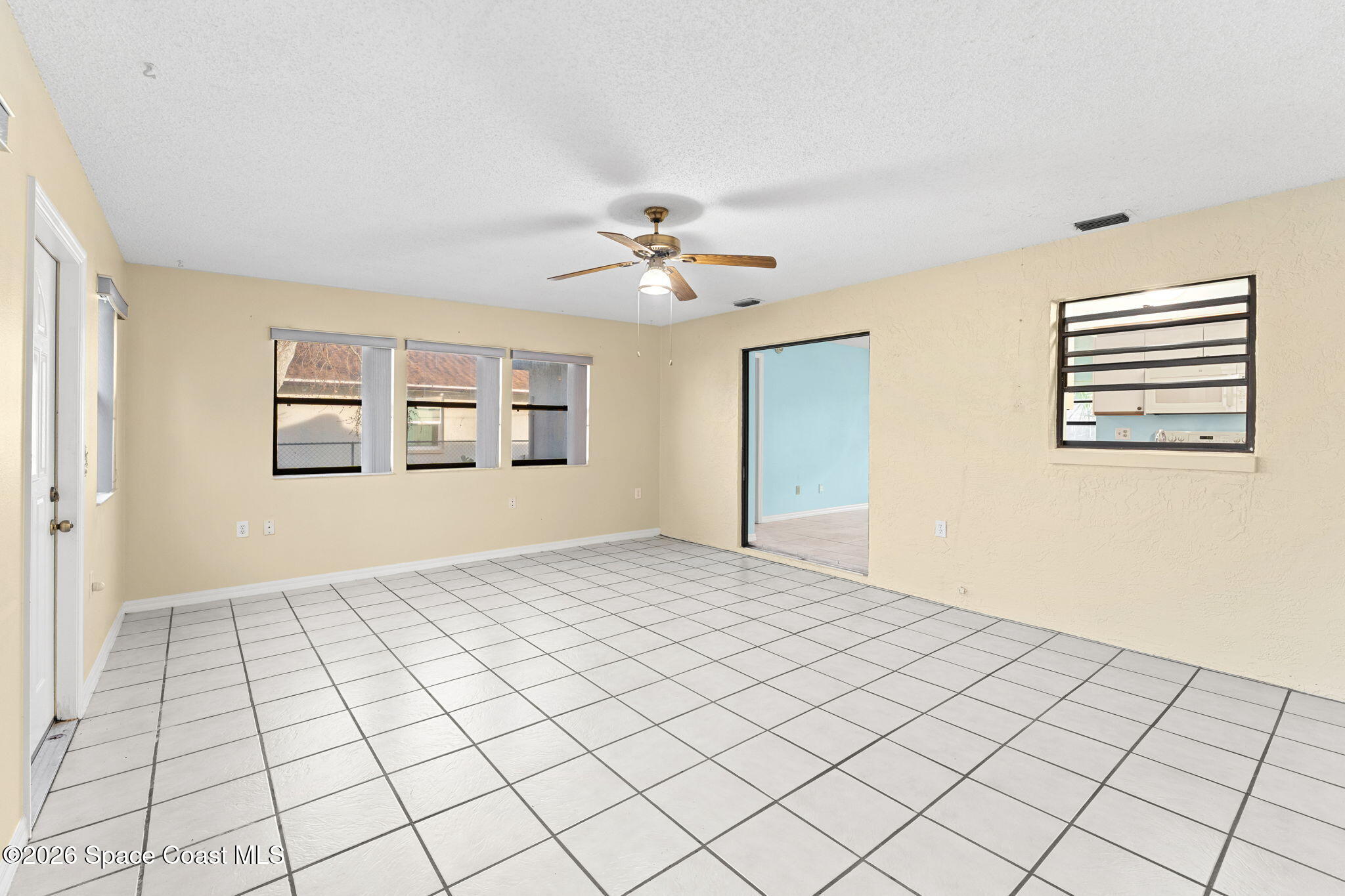 960 Pineland Drive Rockledge, FL 32955 - Photo 12 of 32 a view of an empty room and window
