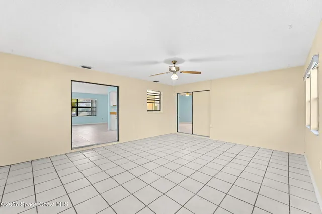 a view of an empty room and window