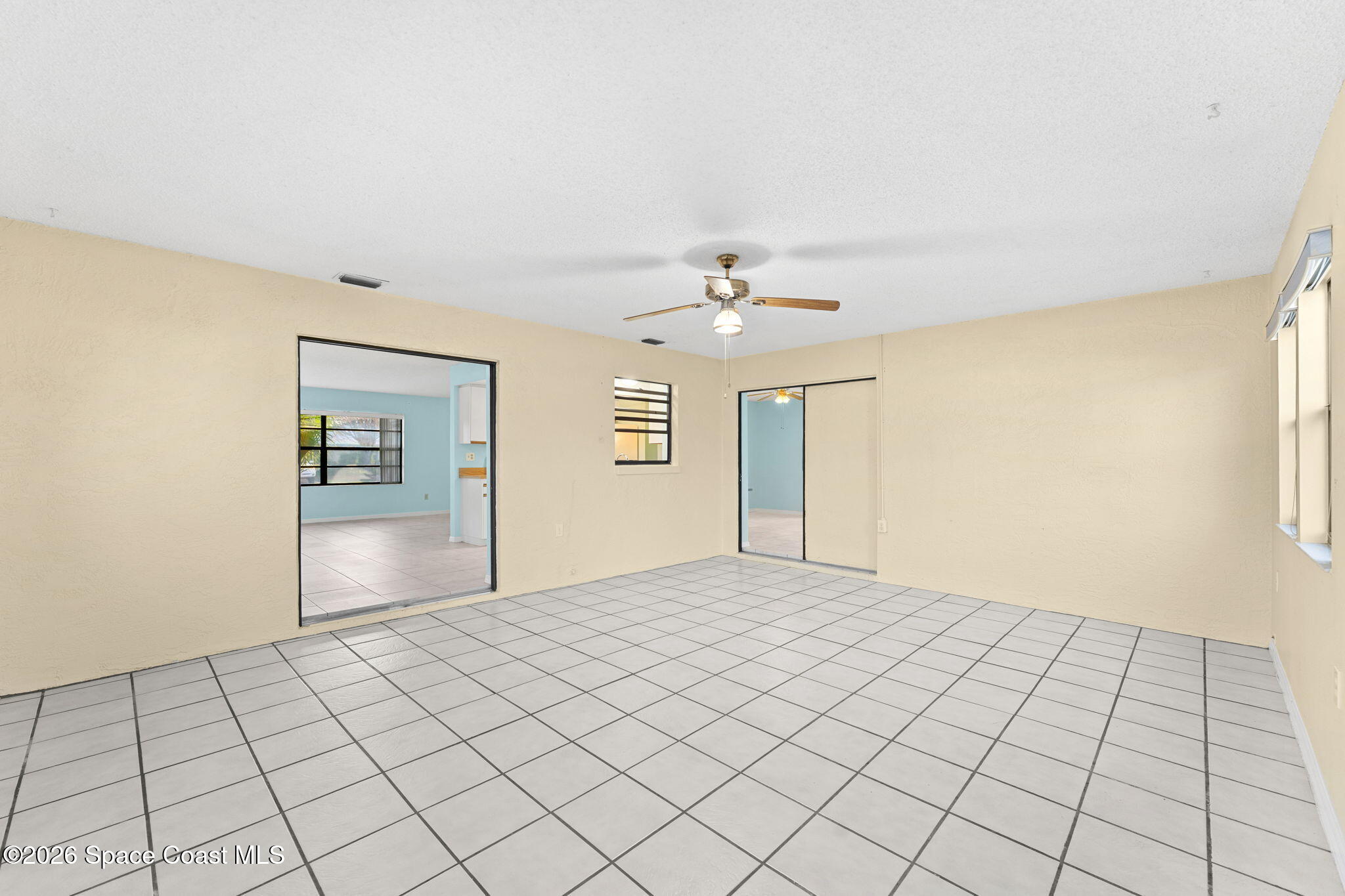 960 Pineland Drive Rockledge, FL 32955 - Photo 13 of 32 a view of an empty room and window