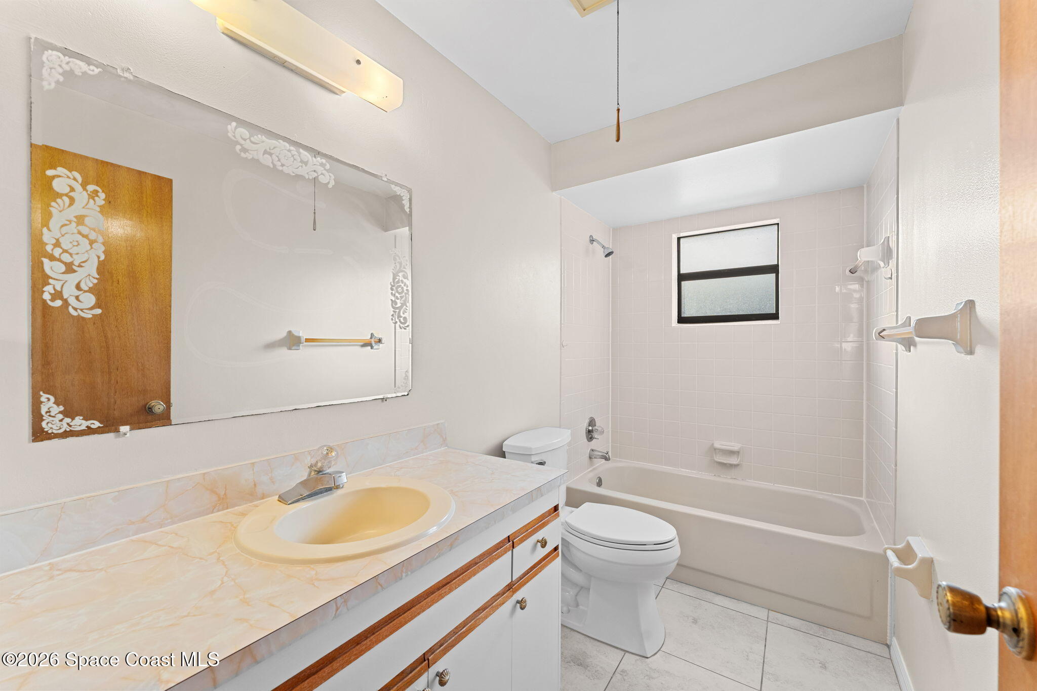 960 Pineland Drive Rockledge, FL 32955 - Photo 20 of 32 a bathroom with a sink toilet tub and shower