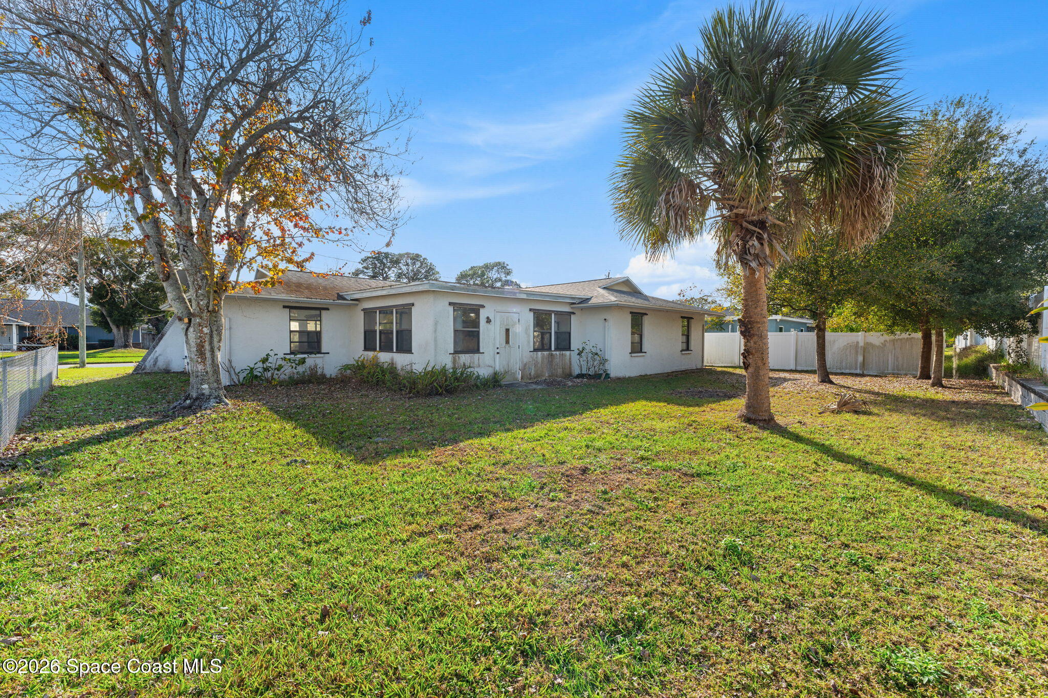 960 Pineland Drive Rockledge, FL 32955 - Photo 23 of 32 a view of a house with a yard