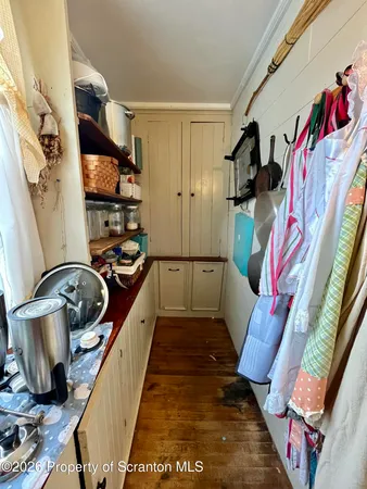 a living room with lots of furniture and a chandelier